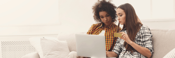 Two women shopping online