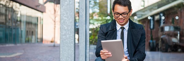 Man looking at his retirement portfolio after reading a blog from Mutual Security Credit Union