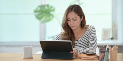 Woman looking at investments