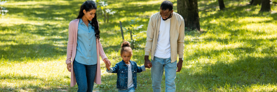 Family waking through the park