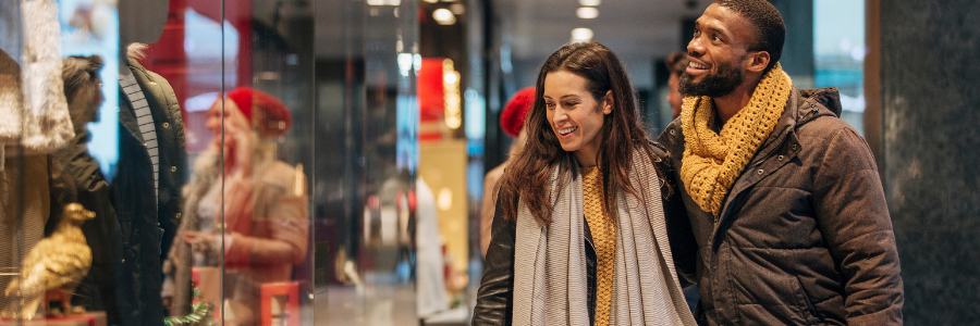 Couple doing holiday shopping.